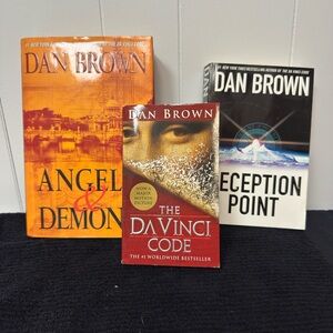 Three best selling author DAN BROWN books, one hardcover and two softcover.
